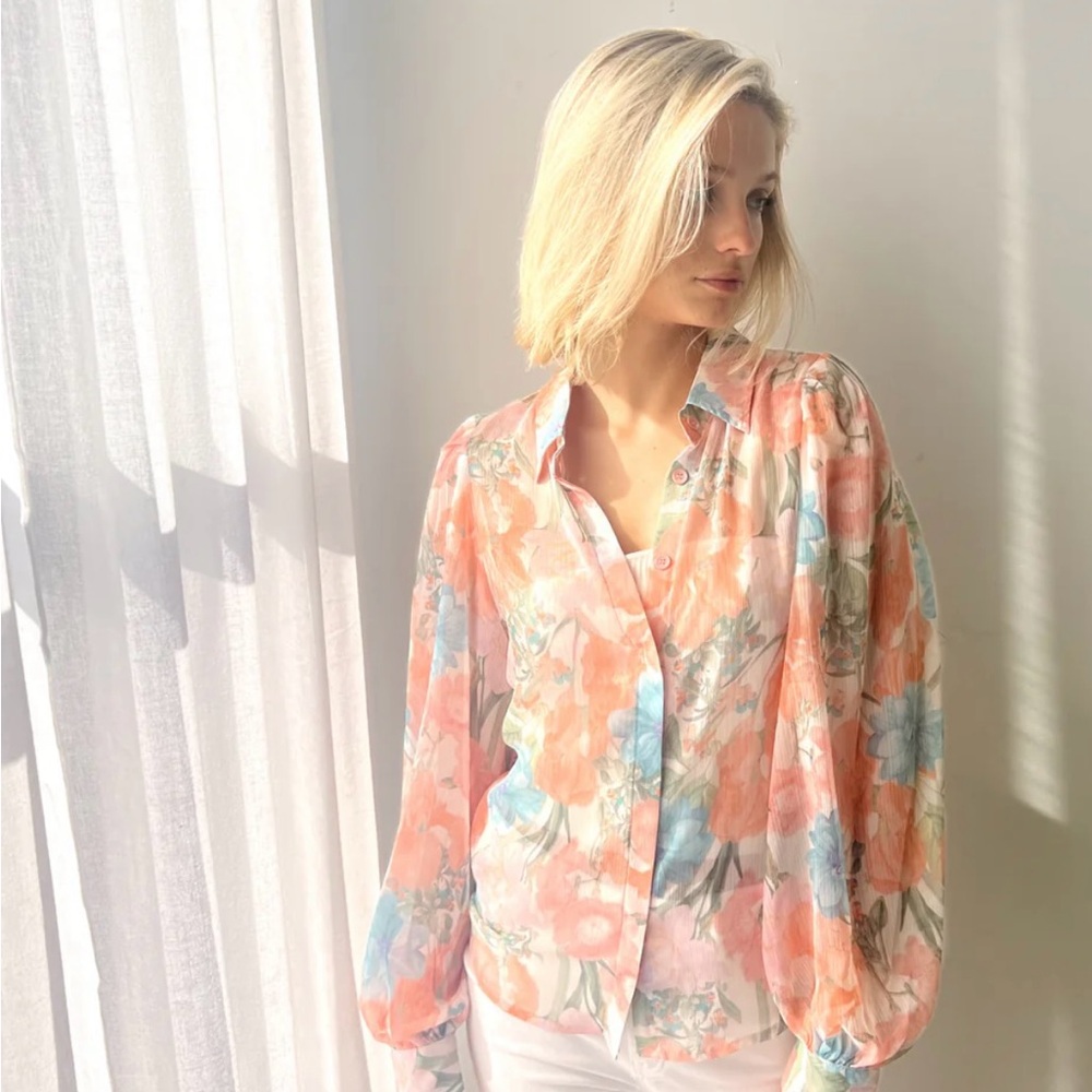 Floral sheer blouse.